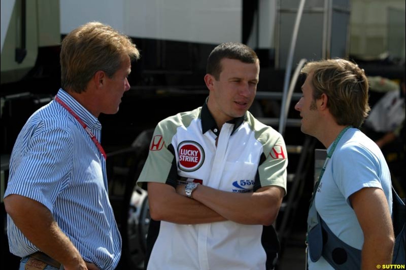 Craig Pollock chats to Olivier Panis and Patrick Lemarie, both of British American Racing, in the paddock. Hungarian Grand Prix, Budapest, Hungary, August 15th 2002.