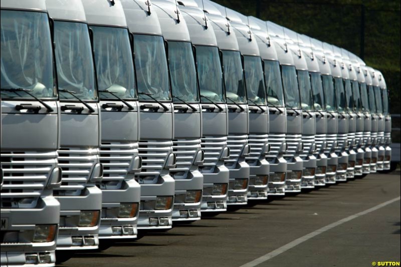 A line of FIA Transporters. Hungarian Grand Prix, Budapest, Hungary, August 15th 2002.