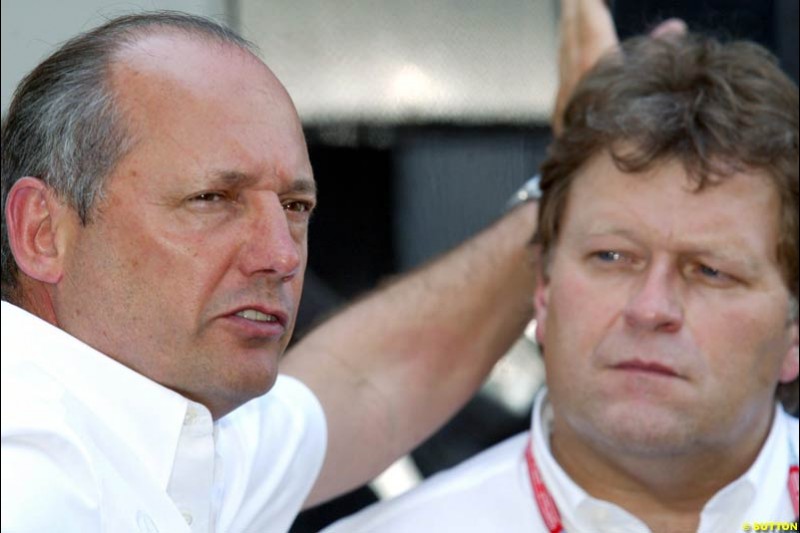 Ron Dennis, McLaren Team Owner, with Norbert Haug, Mercedes Sporting Director, during Qualifying, Hungarian Grand Prix, Budapest, August 17 2002.