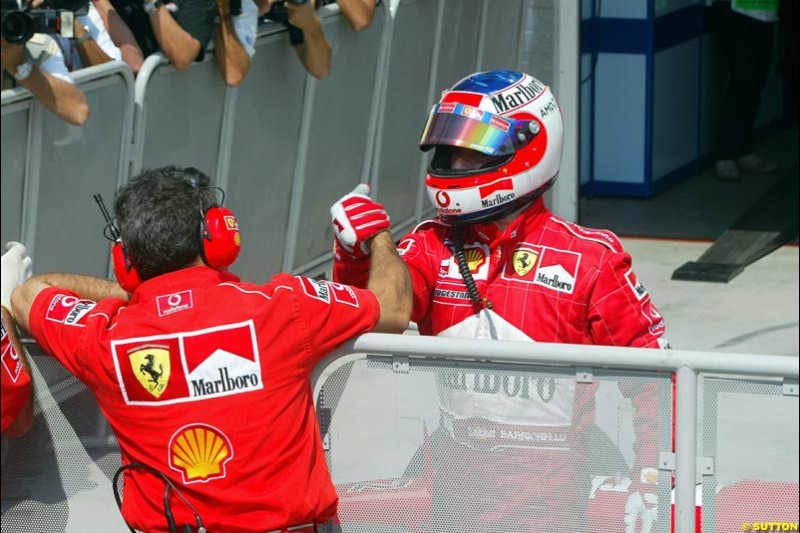 Rubens Barrichello, Ferrari, celebrates his third pole of the season. Hungarian Grand Prix, Budapest, August 17 2002.