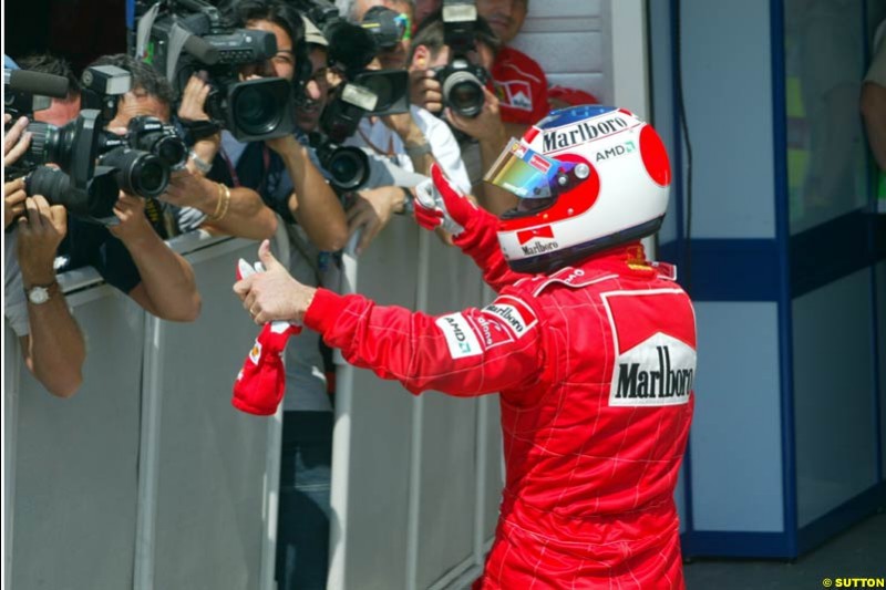 Rubens Barrichello, Ferrari, celebrates his third pole of the season. Hungarian Grand Prix, Budapest, August 17 2002.