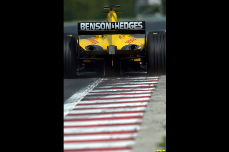A Jordan rides the curb, during Saturday free practice, Hungarian Grand Prix, Budapest, August 17 2002.