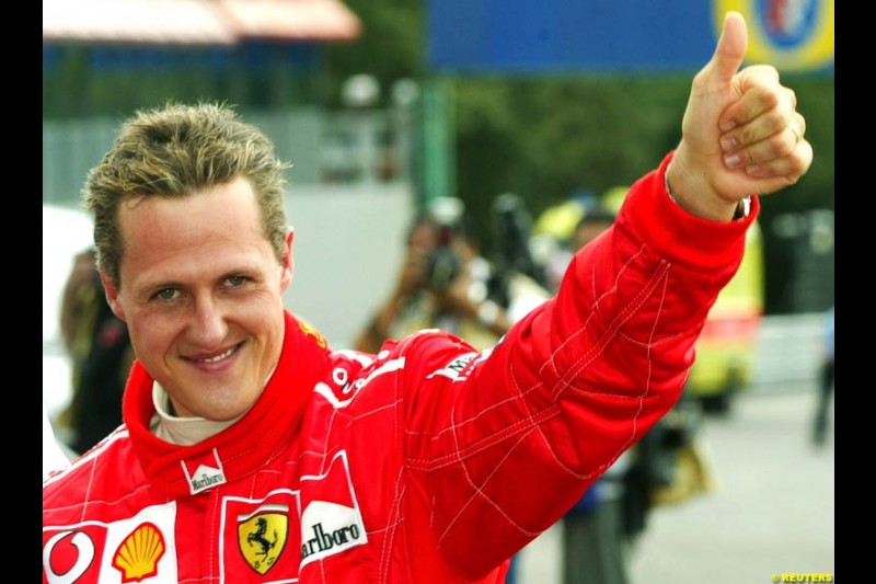 Michael Schumacher celebrates his first Spa-Francorchamps Pole Possition. Belgian Grand Prix, Spa-Francorchamps, Belgium, August 31st 2002.