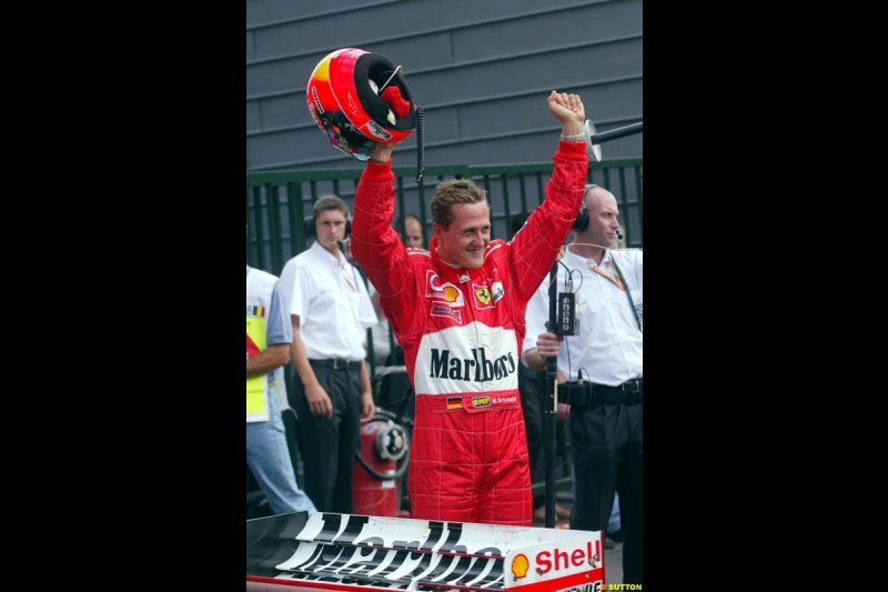 Michael Schumacher celebrates his first Spa-Francorchamps Pole Possition. Belgian Grand Prix, Spa-Francorchamps, Belgium, August 31st 2002.
