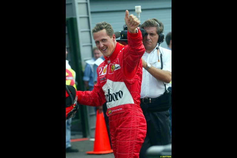 Michael Schumacher celebrates his first Spa-Francorchamps Pole Possition. Belgian Grand Prix, Spa-Francorchamps, Belgium, August 31st 2002.