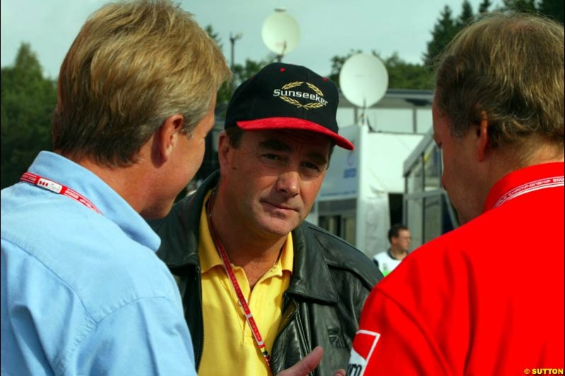 Former World Champion Nigel Mansell in the paddock. Belgian Grand Prix, Spa-Francorchamps, Belgium, August 31st 2002.