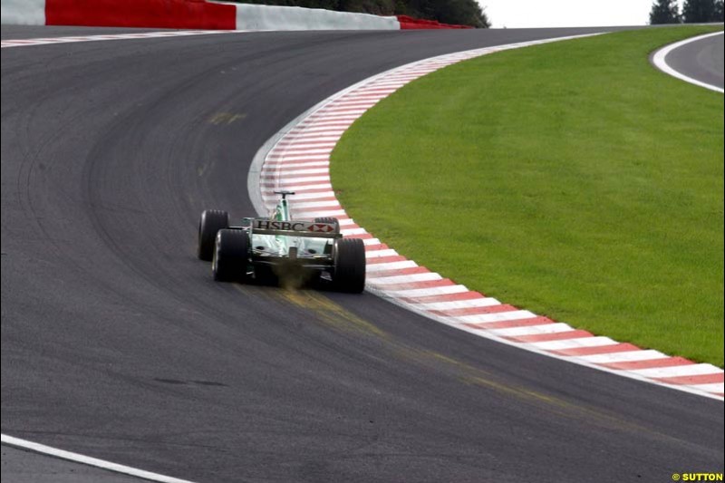 Pedro de la Rosa in the Jaguar takes Eau Rouge during Saturday Free Practice. Belgian Grand Prix, Spa-Francorchamps, Belgium, August 31st 2002.