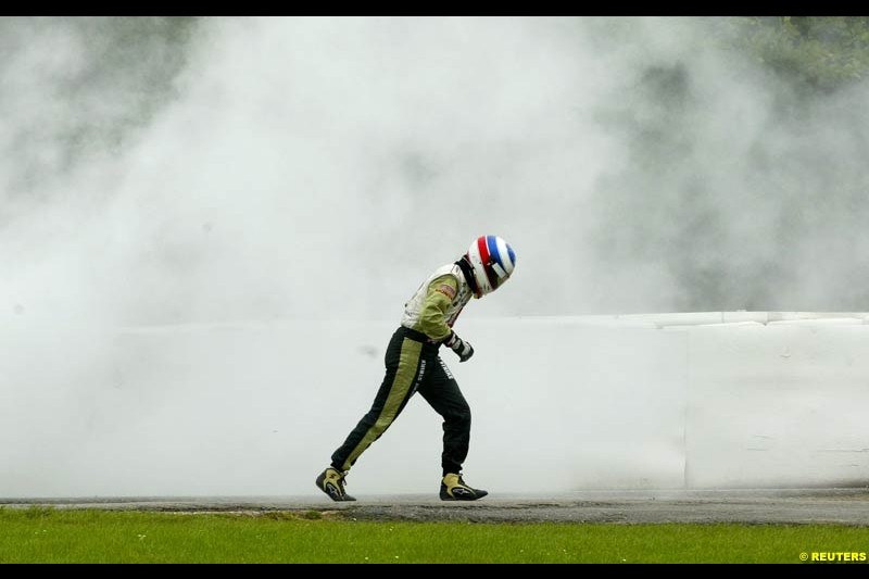 Olivier Panis, British American Racing, walks from his car after an engine failure. Belgian Grand Prix, Spa-Francorchamps, Belgium, September 1st 2002. 