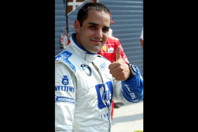 Juan Pablo Montoya, Williams, celebrates Pole. Italian Grand Prix, Monza, Italy. September 14th 2002.