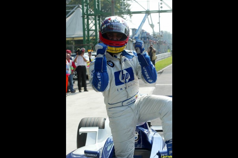 Juan Pablo Montoya, Williams, celebrates Pole. Italian Grand Prix, Monza, Italy. September 14th 2002.