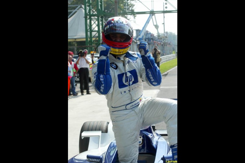 Juan Pablo Montoya, Williams, celebrates Pole. Italian Grand Prix, Monza, Italy. September 14th 2002.
