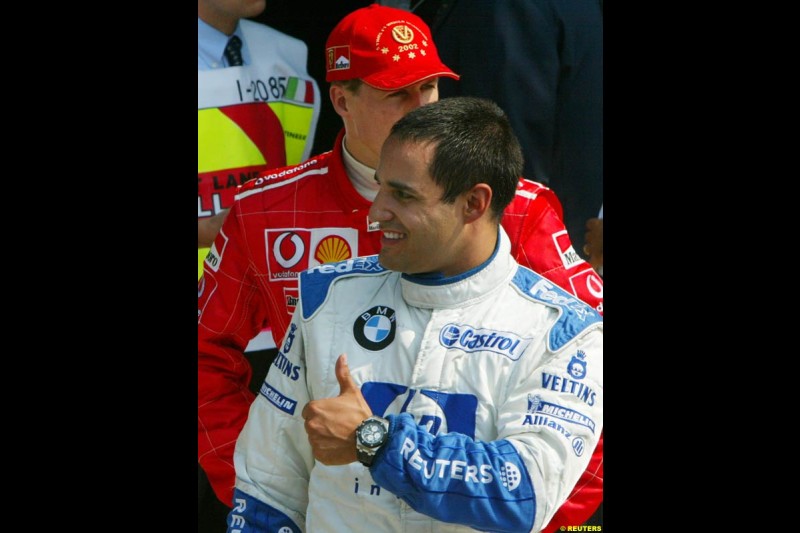 Juan Pablo Montoya, Williams, celebrates Pole. Italian Grand Prix, Monza, Italy. September 14th 2002.