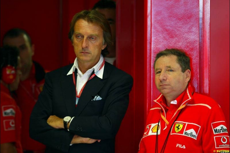 Ferrari President Luca di Montezemolo stands with Ferrari Director Jean Todt during Saturday Free Practice. Italian Grand Prix, Monza, Italy. September 14th 2002.
