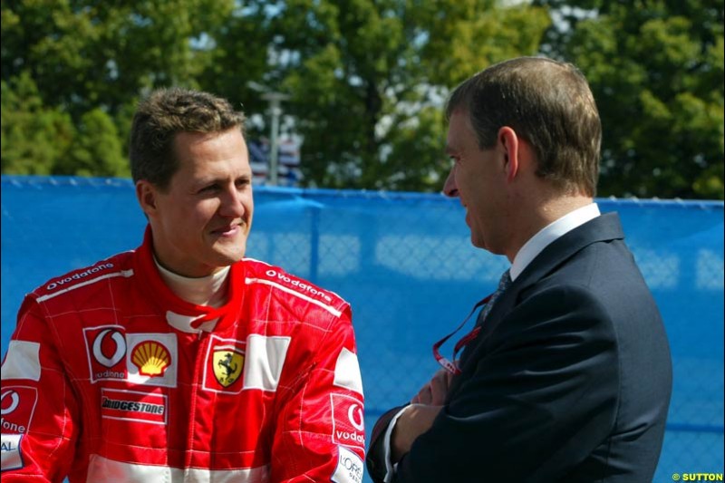 Michael Schumacher, Ferrari, and the Duke of York. Friday Free Practice, United States GP, Indianapolis, September 27th 2002.