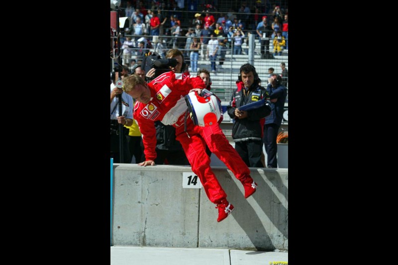 Rubens Barrichello, Ferrari, returns to the pits. Friday Free Practice, United States GP, Indianapolis, September 27th 2002.