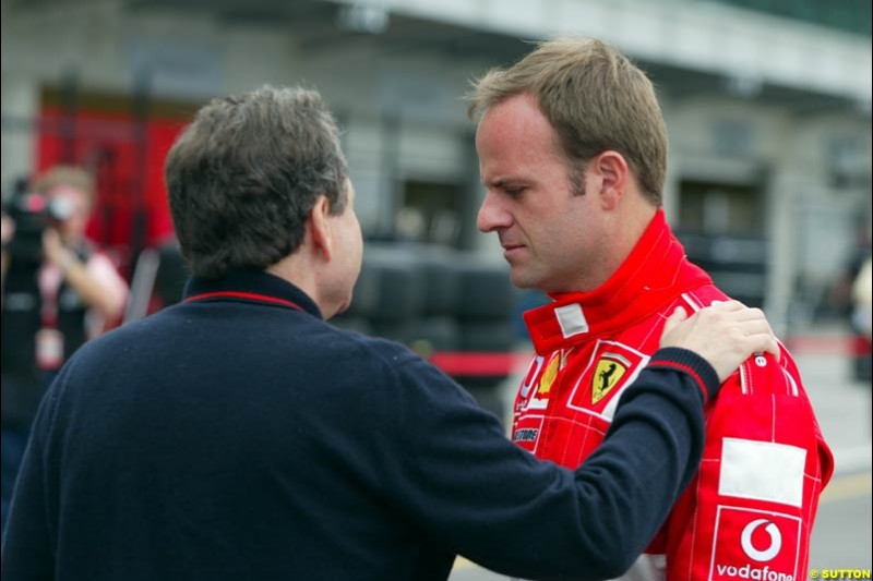 Ferrari's Jean Todt and Rubens Barrichello at the Indianapolis Motor Speedway, United States GP, Indianapolis, September 26th 2002.