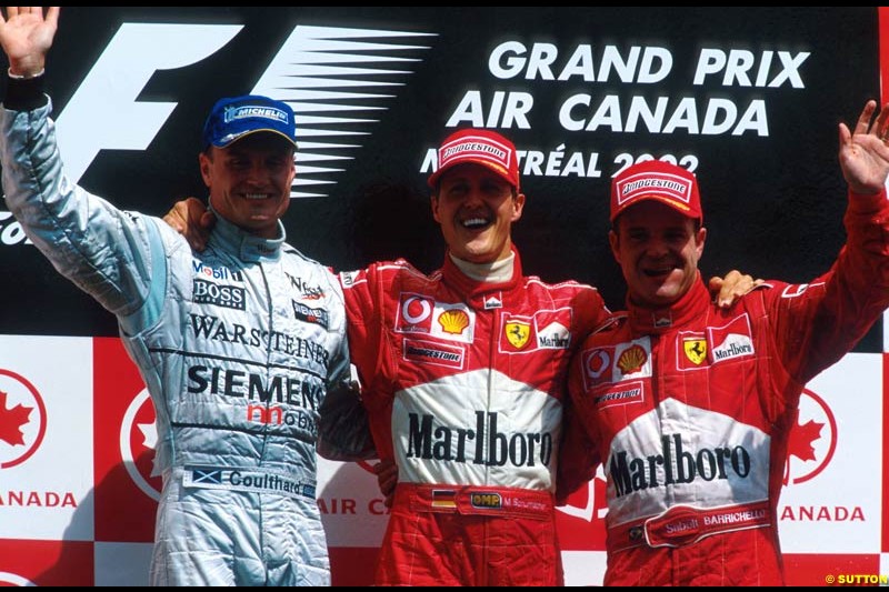 Canadian Grand Prix, Round 8 Podium. 1-Michael Schumacher, Ferrari. 2-Rubens Barrichello, Ferrari. 3-David Coulthard, McLaren.