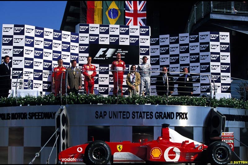 US Grand Prix, Round 16 Podium. 1-Rubens Barrichello, Ferrari. 2-Michael Schumacher, Ferrari. 3-David Coulthard, McLaren.