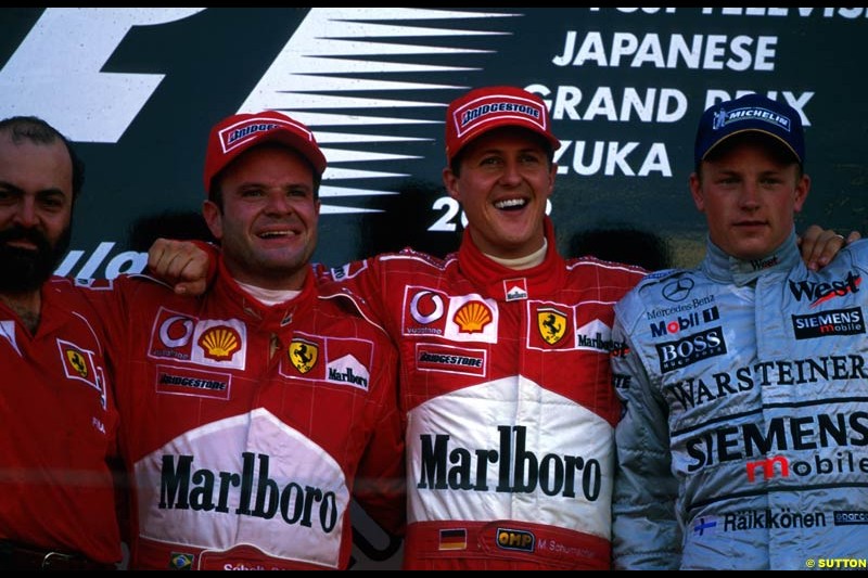 Japanese Grand Prix, Round 17 Podium. 1-Michael Schumacher, Ferrari. 2-Rubens Barrichello Ferrari. 3-Kimi Raikkonen, McLaren.