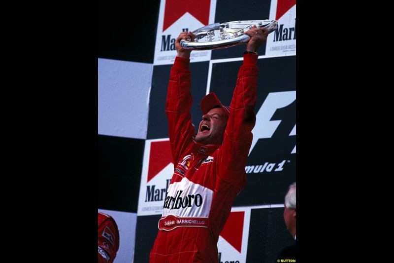 Rubens Barrichello, Ferrari, celebrates victory at the Hungarian Grand Prix, Round 13.