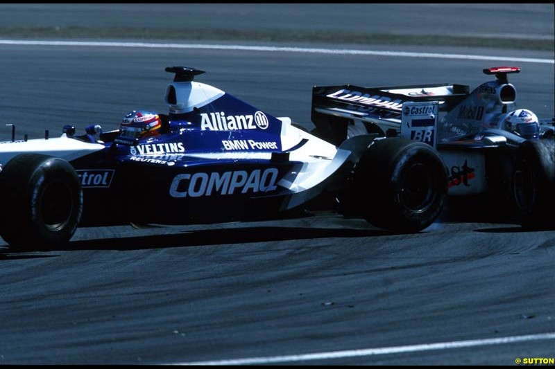 David Coulthard, McLaren, and Juan Pablo Montoya, Williams, tangle. European Grand Prix, Round 9.