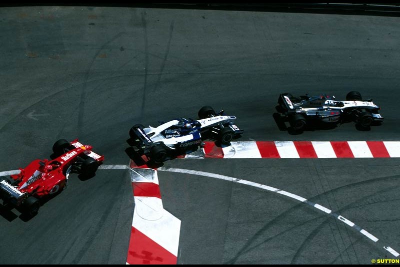 David Coulthard, McLaren, is chased by Juan Pablo Montoya, Williams, and Michael Schumacher, Ferrari. Monaco Grand Prix, Round 7.