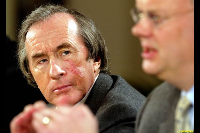 Sir Jackie Stewart and Richard Parry-Jones at the Jaguar Media Briefing. London Landmark Hotel, England. November 26th 2002.