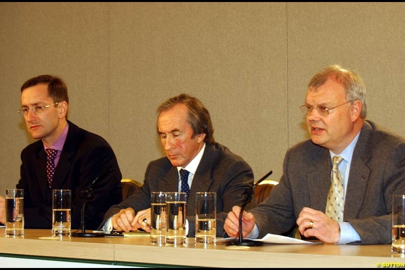 Tony Purnell, Sir Jackie Stewart and Richard Parry-Jones at the Jaguar Media Briefing. London Landmark Hotel, England. November 26th 2002.