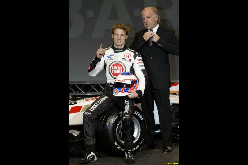 Jenson Button and David Richards at the launch of the British American Racing's 2003 car, the BAR-Honda 005. Montjuich Park, Barcelona, Spain. January 14th 2003.