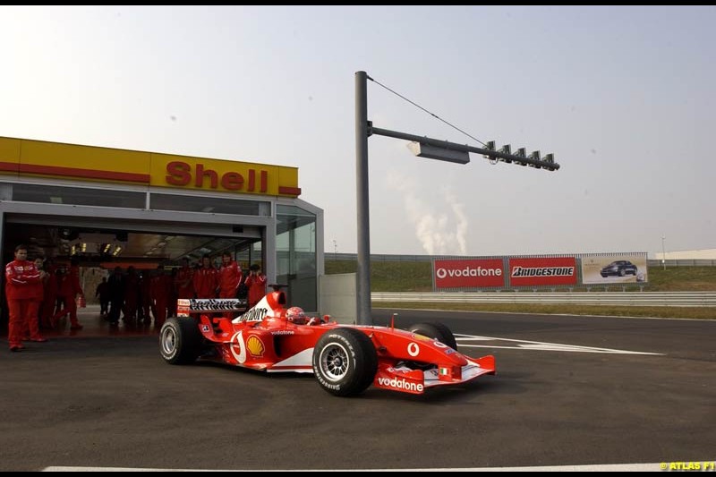 Michael Schumacher tests the new Ferrari F2003-GA at the Fiorano circuit in Italy. 11th February 2003.