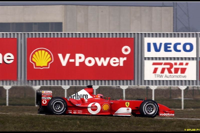 Michael Schumacher tests the new Ferrari F2003-GA at the Fiorano circuit in Italy. 11th February 2003.