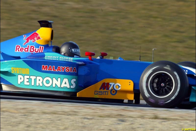 Nick Heidfeld, Sauber, wears an all black helmet whilst testing the HANS Device at Imola, Italy. 18th February 2003.