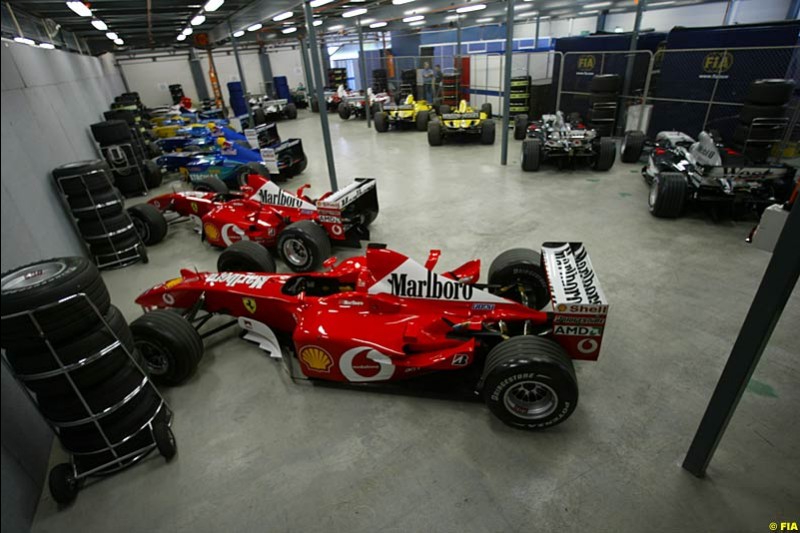 All 18 cars (without the two Minardis) are held at Parc Ferme overnight prior to the race. Saturday, Australian GP, March 8th 2003. Photo © FIA