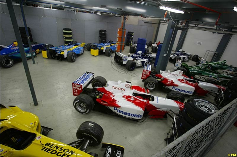 All 18 cars (without the two Minardis) are held at Parc Ferme overnight prior to the race. Saturday, Australian GP, March 8th 2003. Photo © FIA