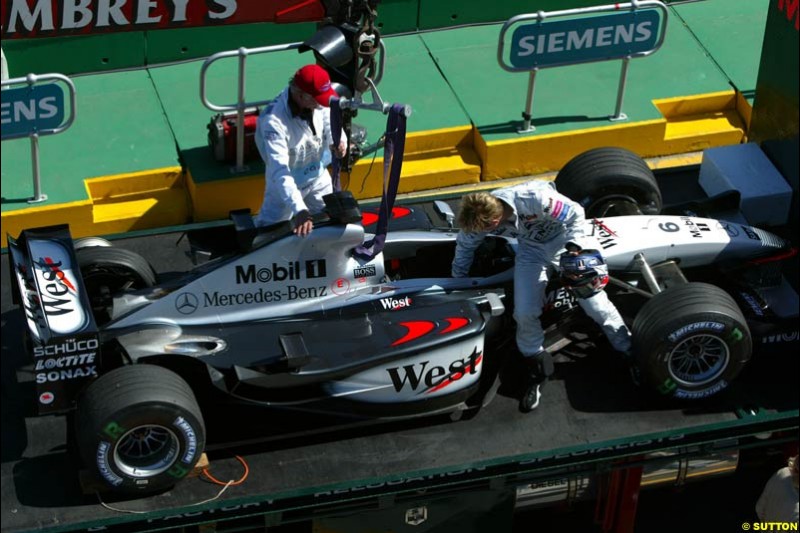 Kimi Raikkonen blows a tyre during Saturday's qualifying for the Australian GP. Melbourne, March 8th, 2003.