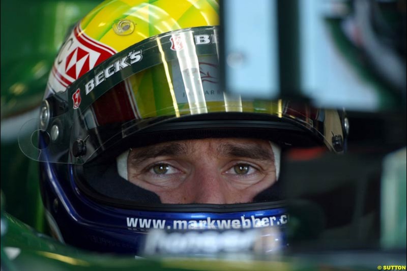 Mark Webber, Jaguar, prepares for Saturday's qualifying for the Australian GP. Melbourne, March 8th, 2003.