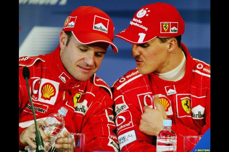 Rubens Barrichello and Michael Schumacher, Ferrari, at the post-qualifying press conference. Australian GP, Melbourne, March 8th 2003.