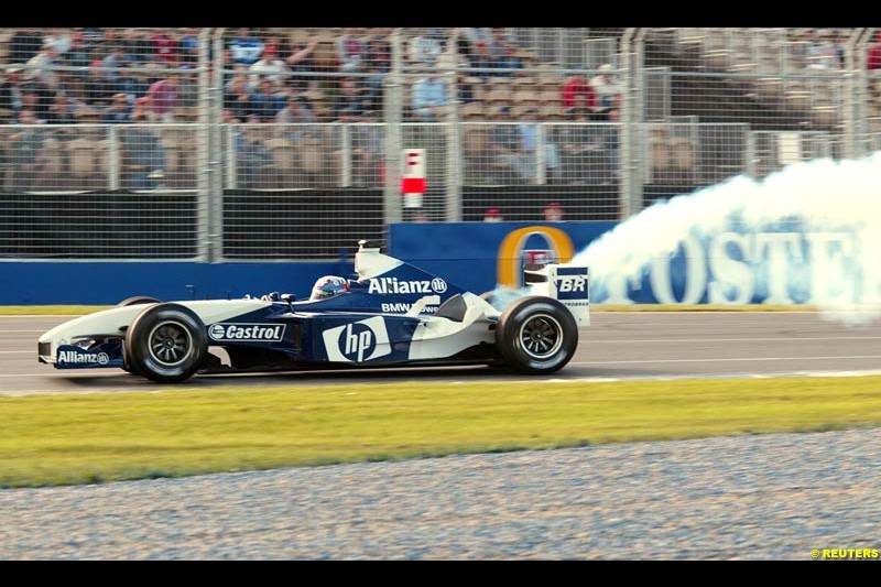 Juan Pablo Montoya's Williams BMW smoking during Saturday's free practice for the Australian GP. Melbourne, March 8th 2003.