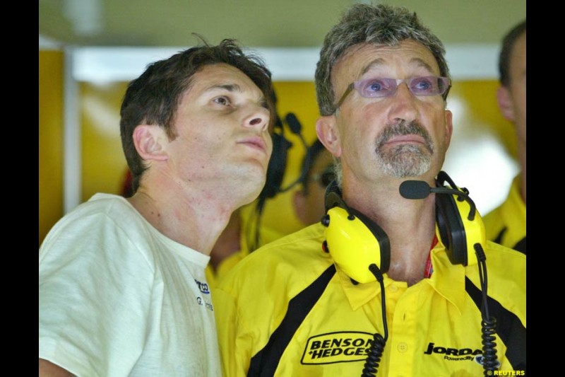 Giancarlo Fisichella and Eddie Jordan during Friday qualifying for the Malaysian GP. Sepang, March 21st 2003.