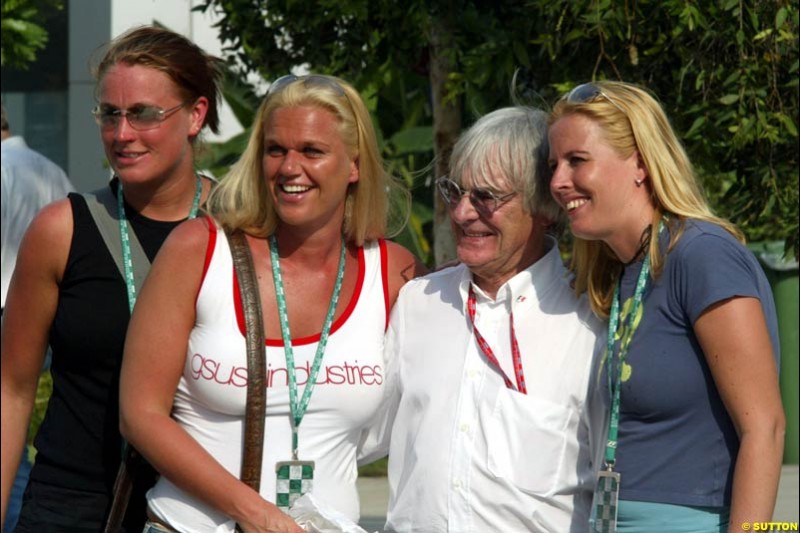 Bernie Ecclestone and fans. Friday qualifying for the Malaysian GP. Sepang, March 21st 2003.