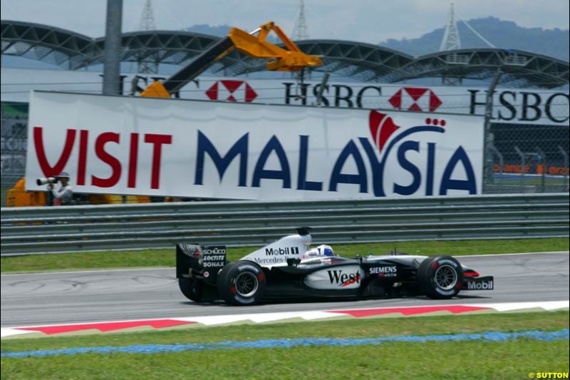 David Coulthard, McLaren, during Friday qualifying for the Malaysian GP. Sepang, March 21st 2003.