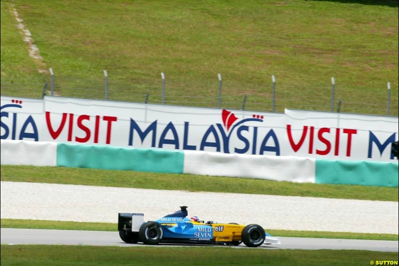 Jarno Trulli, Renault, during Friday qualifying for the Malaysian GP. Sepang, March 21st 2003.