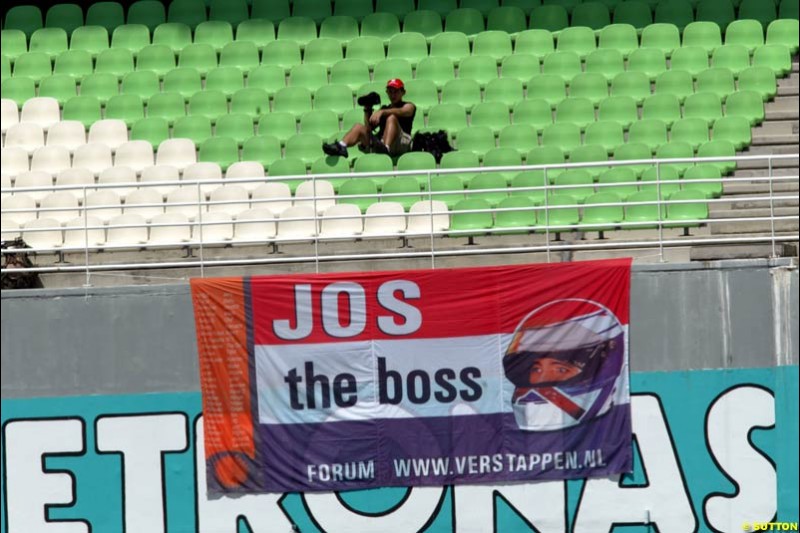 Jos Verstappen fans at the Malaysian GP. Sepang International Circuit, March 21st 2003.