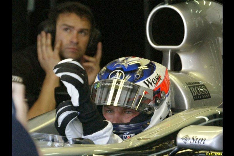 Kimi Raikkonen, McLaren. Friday qualifying for the Malaysian GP. Sepang International Circuit, March 21st 2003.