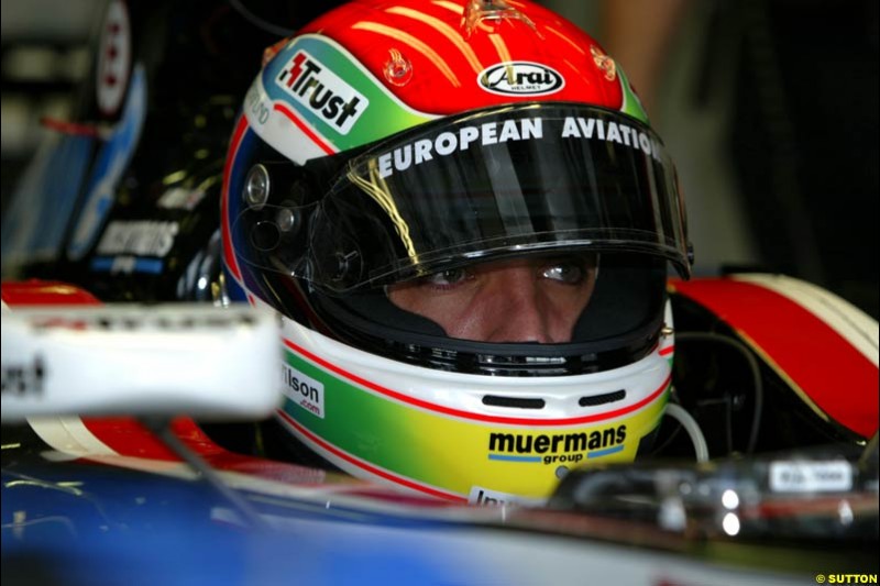 Justin Wilson, Minardi, during Friday morning testing at Sepang International Circuit. Malaysian GP, March 21st 2003.