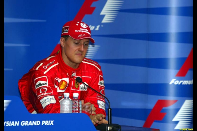 Michael Schumacher, Ferrari, at the Post qualifying press conference. Saturday, Malaysian GP. Sepang, March 22nd 2003.