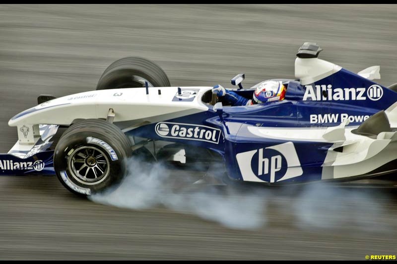 Juan Pablo Montoya, Williams, during Saturday qualifying for the Malaysian GP. Sepang, March 22nd 2003.