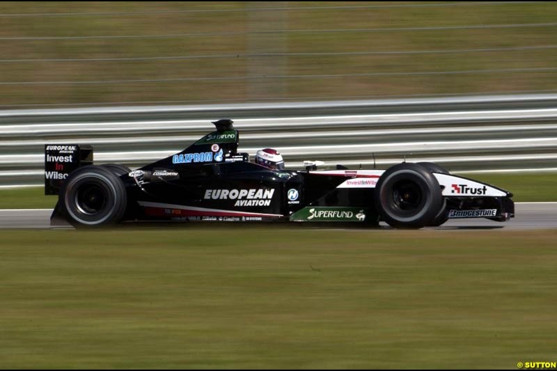 Jos Verstappen, Minardi, during Saturday qualifying for the Malaysian GP. Sepang, March 22nd 2003.