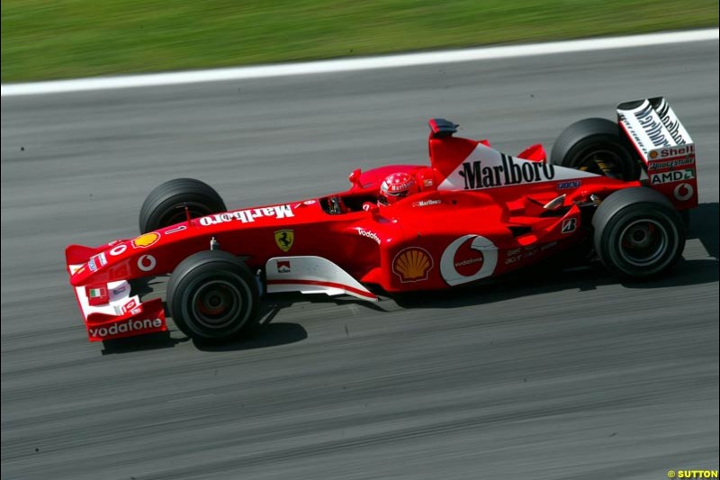 Michael Schumacher, Ferrari, during Saturday qualifying for the Malaysian GP. Sepang, March 22nd 2003.