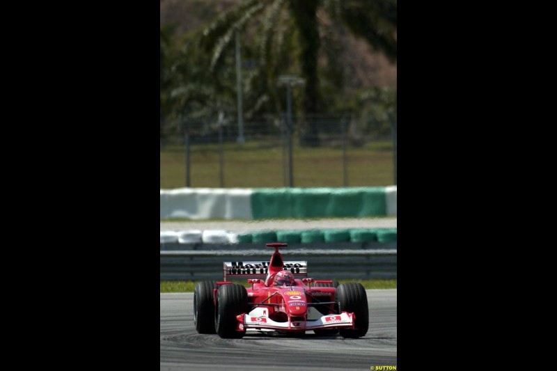 Michael Schumacher, Ferrari, during Saturday qualifying for the Malaysian GP. Sepang, March 22nd 2003.